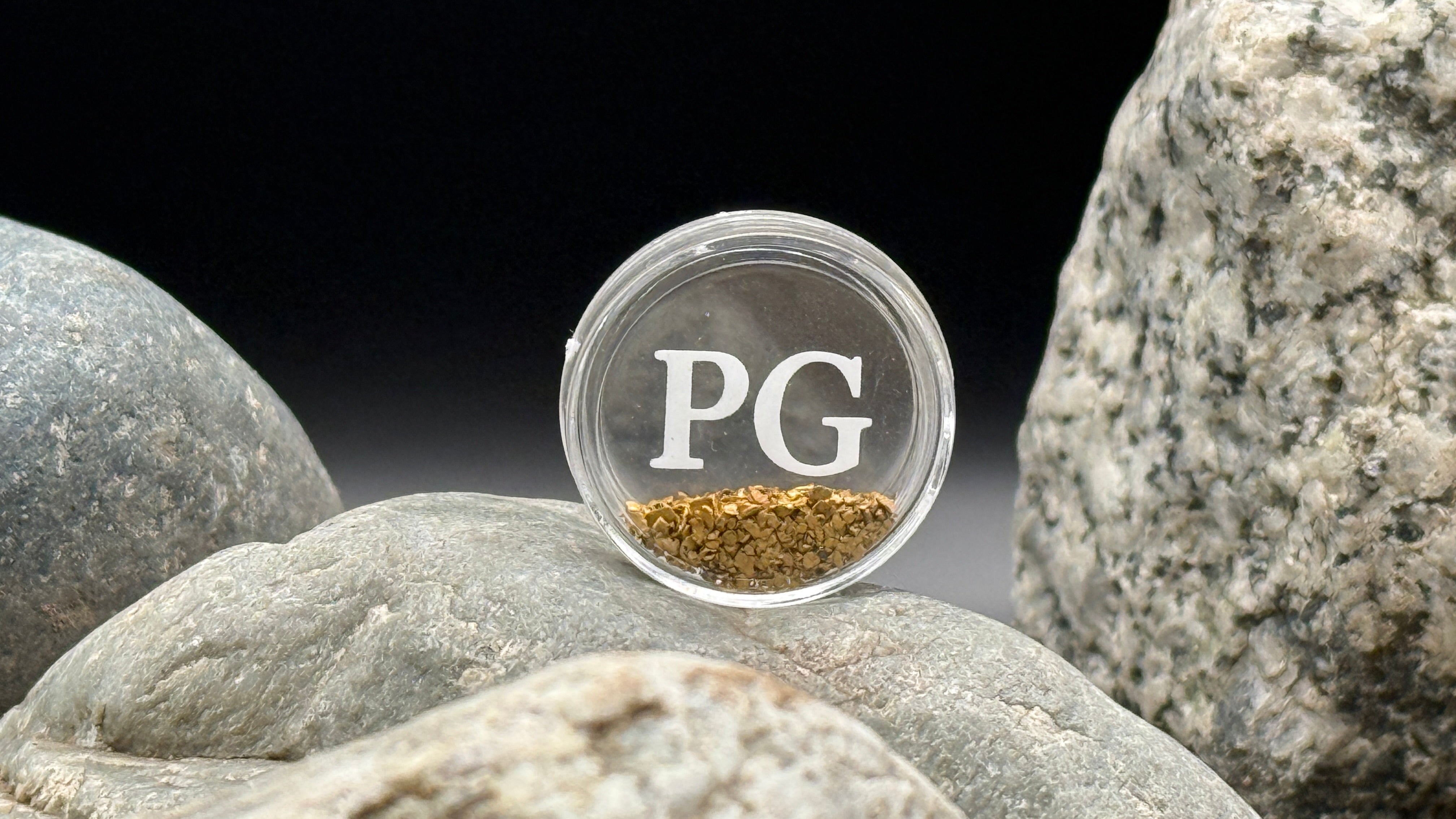 Coin shaped container with Yukon gold flakes Dominion Creek Parker Schnabel gold